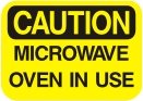 microwave oven in use