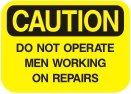 do not operate men working on repairs